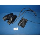 A set of Nikon 9 x 25 CF II Compact Binoculars together with a set of Praktica 8 x 21s Compact