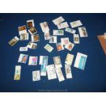 UK postage stamps 1966-1970, 34 commemorative and definitive stamps.
