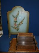 A wooden tray, letter rack, book rest and a wooden fire screen decorated with flowers painted green.