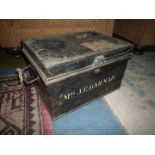 An old black painted steel Deeds Box having swing handles and stencilled to the front with the name