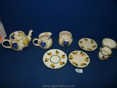 A small quantity of china including Westfield's Art pottery sponge ware teapot, jug and sugar bowl,