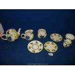 A small quantity of china including Westfield's Art pottery sponge ware teapot, jug and sugar bowl,