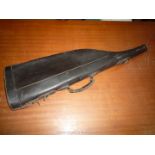 A dark brown leather "Leg o' Mutton" gun case, 30 3/4" long overall,