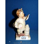 A Goebel figurine of a Pharmacist,