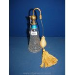 A cut glass scent atomiser with silver and blue enamel mount, 10" tall.