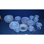 A quantity of Brannon pottery tea and dinner ware including mugs, saucers, bowls, posy vase,