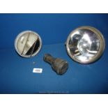 Two 1940's car or truck lamp assemblies with bulbs and a John Bull spare bulb holder.
