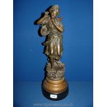 A bronze of a young girl carrying a basket after Rancoulet c. 1880 (Art Nouveau), 21" tall.