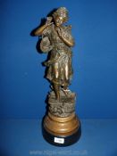 A bronze of a young girl carrying a basket after Rancoulet c. 1880 (Art Nouveau), 21" tall.