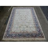 A large ivory ground Kashmir carpet with large central panel of animals in woodland,