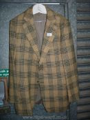 A blue and cream check Jacket, Magee, size 38/40.