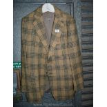 A blue and cream check Jacket, Magee, size 38/40.