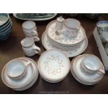 A part Denby 'Falling Leaves' pattern dinner and tea service, dinner, side and meat plate, cup,