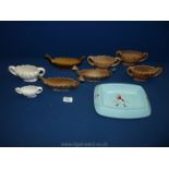 A quantity of Wade china including Johnny Walker ashtray, brown and white vases,
