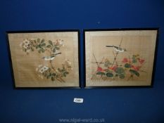Two Oriental paintings on silk of birds and blossom in black frames, 10 1/2" x 12 1/2".
