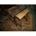 A Nest of Two rectangular Oak occasional tables, the larger 24'' x 13'' x 18'' high.