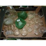 A quantity of glass including glass jelly moulds, eight leaf shaped sweet dishes, sherry glasses,