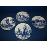 Four Delft Blauw blue and white plates.
