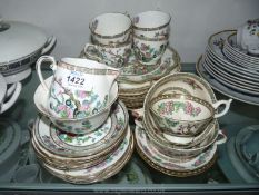 A quantity of Indian Tree saucers, cups, tea plates, milk jug, sugar bowls,