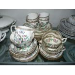 A quantity of Indian Tree saucers, cups, tea plates, milk jug, sugar bowls,