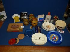 A quantity of brewerania including ashtrays, Strongbow money box, cigar box, Wade barrel mugs etc.