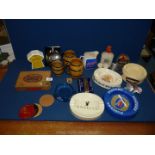 A quantity of brewerania including ashtrays, Strongbow money box, cigar box, Wade barrel mugs etc.