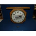 A rectangular Oak cased top-mounting, double-faced Station platform style Clock,