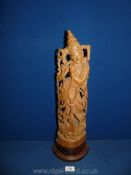 An intricately carved wooden Buddha,