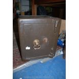 A small Safe with brass door handle, 17'' high x 15'' x 14'',