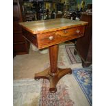 A believed Regency period Rosewood Work Table standing on a tapering octagonal pillar with a