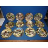 Twelve display plates by Robert Hersley 'The Victorian Garden' series edged with 22 ct gold.