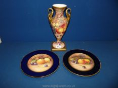 A two handled Vase decorated with fruit hand painted by G.
