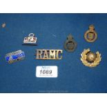 A quantity of badges including two Essex Yeomanry cap badges, pre 1916 along with R.A.M.
