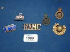 A quantity of badges including two Essex Yeomanry cap badges, pre 1916 along with R.A.M.