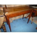 A banded top Mahogany flap-over swivel top Side/Card Table standing on tapering square legs and