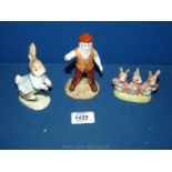 A Royal Albert Peter Rabbit figure 'Flopsy, Mopsie and Cottontail and Mr. Mcgregor'.