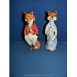 A pair of Cinque Port (Rye Pottery) figures of Lady and a Gentleman foxes, 9 1/2" tall.