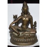 A good antique Nepalese bronze figure of the seated Tara,