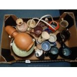 A quantity of studio pottery including Wensleydale, Wade, Homend , mugs, vases, wall plates etc.