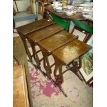 A Nest of Four Chinoiserie lacquered Occasional Tables,