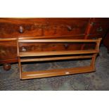 An "Ercol" golden coloured wall-hanging two-tier Plate Rack.