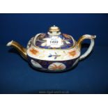 A Crown Derby Imari style Teapot in dark blue and peach with gilt decoration,