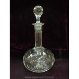 A Cut Glass bulbous Decanter with stopper.