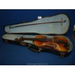 A cased Violin, body 14" long, total length 23" long,