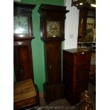 An Oak cased Long-case Clock having an 11'' square brass face with cast brass spandrels and matted