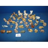A quantity of Wade Whimsies including a duck, dogs, monkey etc plus a USSR dog etc.