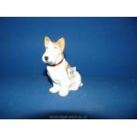 An old Sylvac sitting dog in brown and white, 5 1/4'' tall.