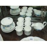 A Wedgwood Clementine part Coffee set comprising six coffee cans and saucers,