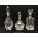 Three Royal Stuart cut glass Decanters with stoppers,