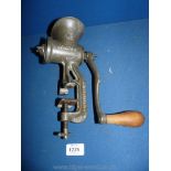 An antique British made meat grinder/mincer.